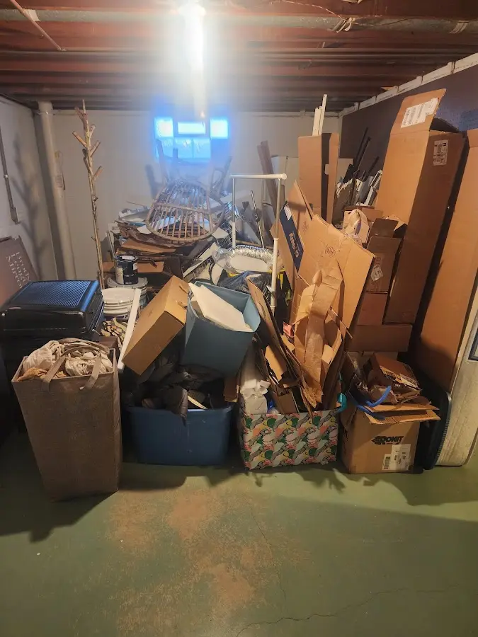 Roll-off dumpster container at job site for 20 Yard Dumpster Rental in Angels